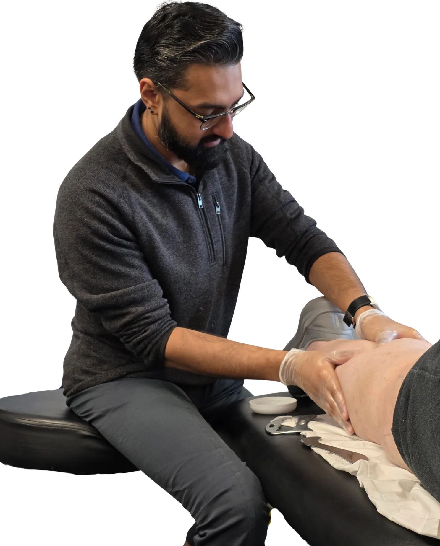 Dr. Raj treating a client